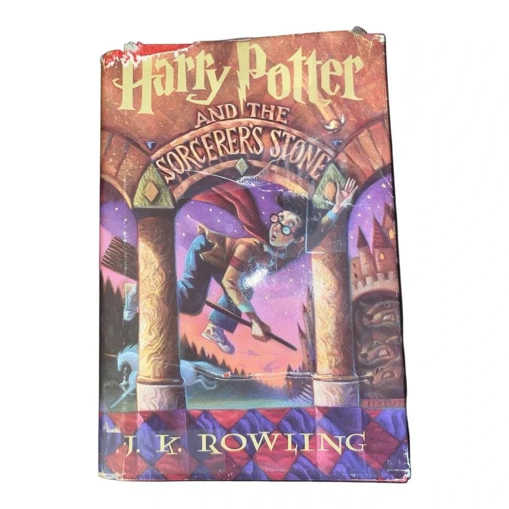 Harry Potter and the Sorcerer's Stone by J. K. Rowling (1998,‎ Hardcover)